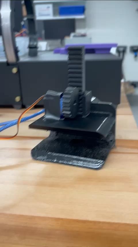 3D printed gearbox and servo on bench